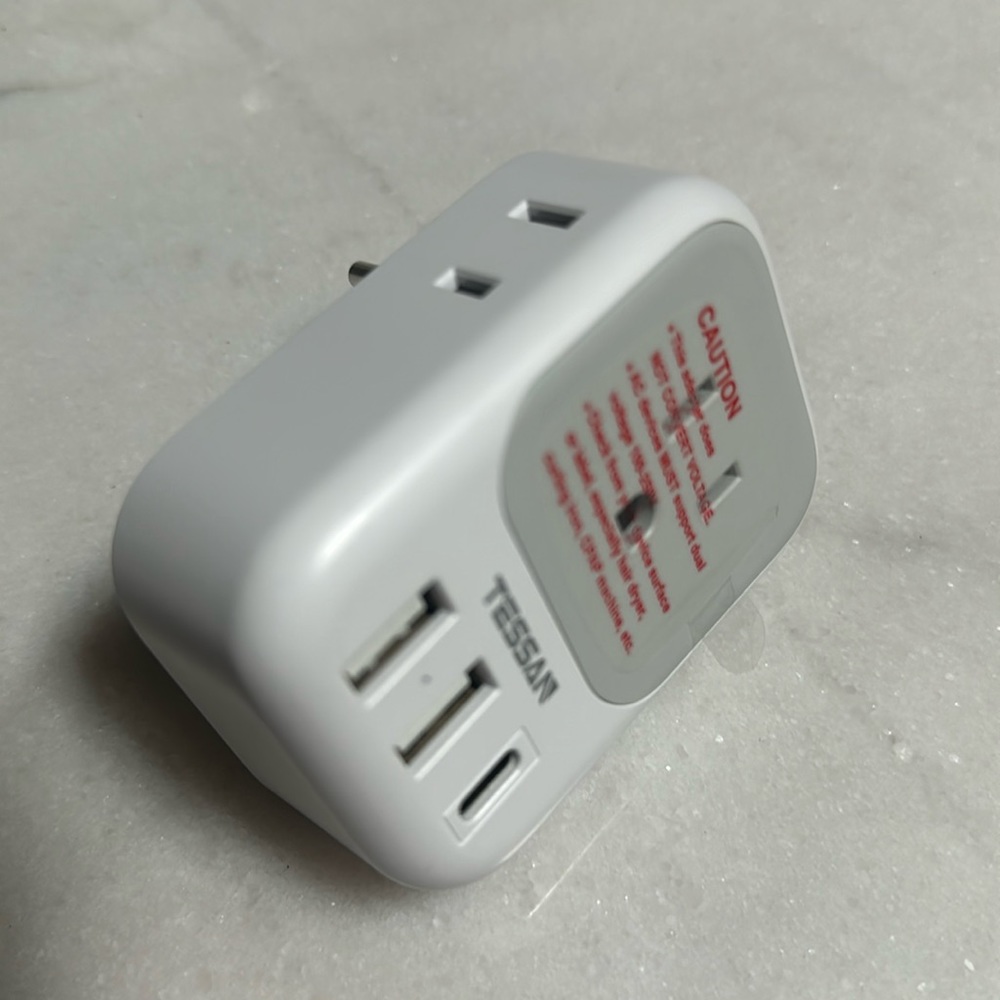 Brand new Tessan travel adapter
